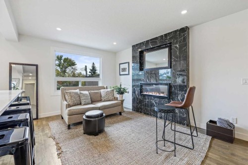 2126 18A Street Sw, Calgary, AB - Indoor Photo Showing Living Room With Fireplace
