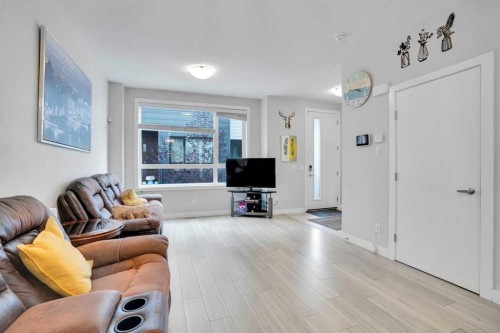 318 Redstone Crescent Ne, Calgary, AB - Indoor Photo Showing Living Room