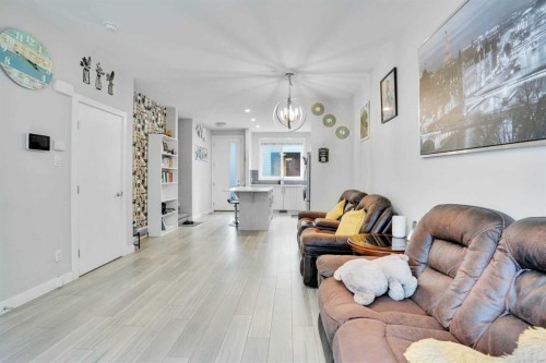 318 Redstone Crescent Ne, Calgary, AB - Indoor Photo Showing Living Room