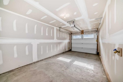 710 Sage Hill Grove Nw, Calgary, AB - Indoor Photo Showing Garage