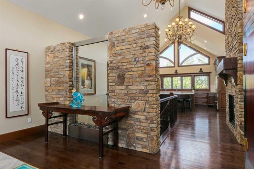 1661 St Andrews Place Nw, Calgary, AB - Indoor Photo Showing Other Room With Fireplace
