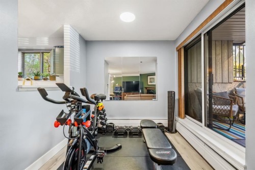 7-821 3 Avenue Sw, Calgary, AB - Indoor Photo Showing Gym Room