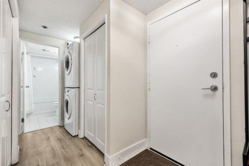 7-821 3 Avenue Sw, Calgary, AB - Indoor Photo Showing Laundry Room