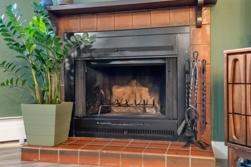 7-821 3 Avenue Sw, Calgary, AB - Indoor Photo Showing Other Room With Fireplace