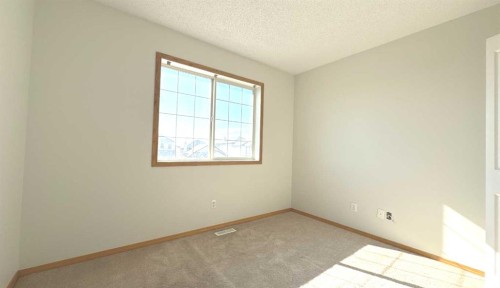 244 Los Alamos Place Ne, Calgary, AB - Indoor Photo Showing Other Room