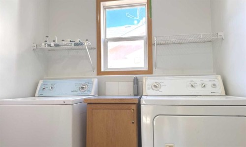 244 Los Alamos Place Ne, Calgary, AB - Indoor Photo Showing Laundry Room
