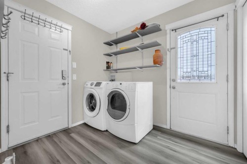 4 Saddlecreek Terrace Ne, Calgary, AB - Indoor Photo Showing Laundry Room