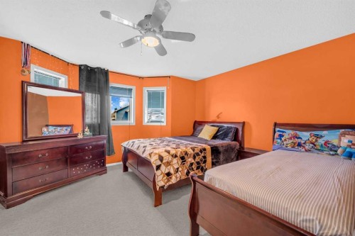 4 Saddlecreek Terrace Ne, Calgary, AB - Indoor Photo Showing Bedroom