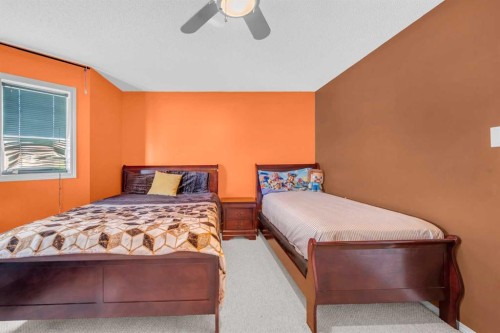4 Saddlecreek Terrace Ne, Calgary, AB - Indoor Photo Showing Bedroom