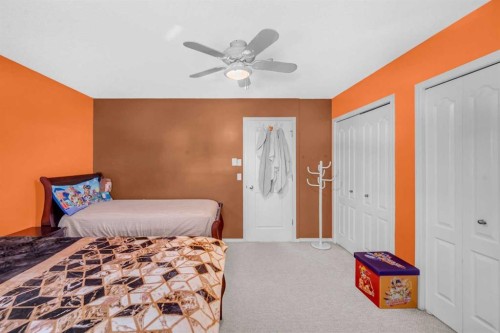 4 Saddlecreek Terrace Ne, Calgary, AB - Indoor Photo Showing Bedroom