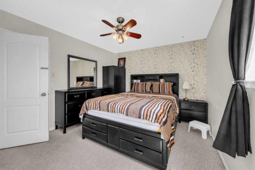 4 Saddlecreek Terrace Ne, Calgary, AB - Indoor Photo Showing Bedroom