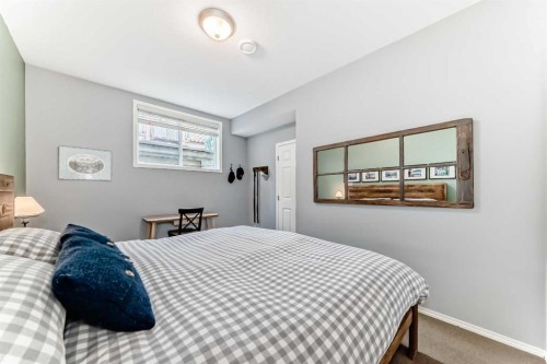 12-903 Wilson Way, Canmore, AB - Indoor Photo Showing Bedroom