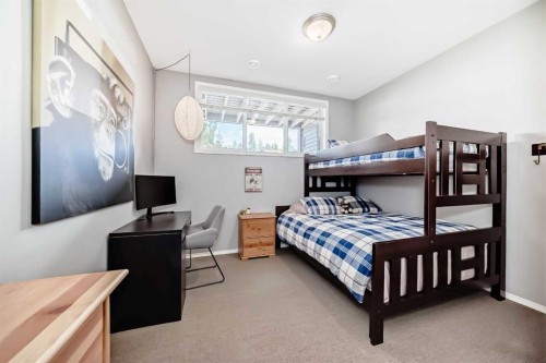 12-903 Wilson Way, Canmore, AB - Indoor Photo Showing Bedroom