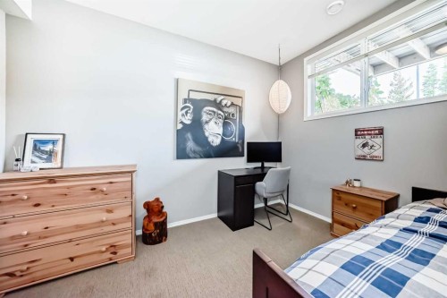 12-903 Wilson Way, Canmore, AB - Indoor Photo Showing Bedroom