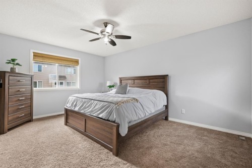 2938 Chinook Winds Drive Sw, Airdrie, AB - Indoor Photo Showing Bedroom