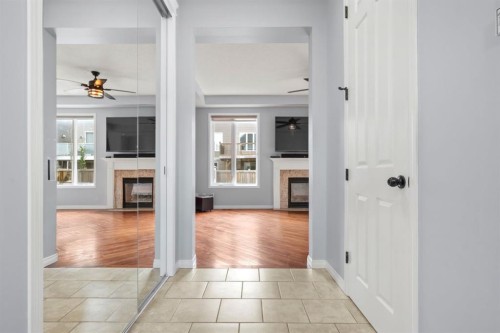 2938 Chinook Winds Drive Sw, Airdrie, AB - Indoor Photo Showing Other Room With Fireplace