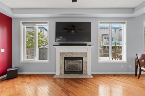 2938 Chinook Winds Drive Sw, Airdrie, AB - Indoor Photo Showing Living Room With Fireplace