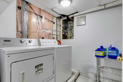 100 Allandale Close Se, Calgary, AB - Indoor Photo Showing Laundry Room