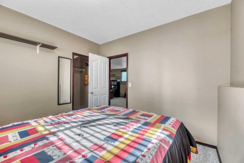102 Parklane Drive, Strathmore, AB - Indoor Photo Showing Bedroom