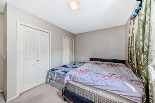 147 Saddlebrook Point Ne, Calgary, AB - Indoor Photo Showing Bedroom
