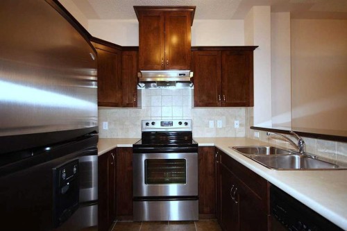 518-30 Discovery Ridge Close Sw, Calgary, AB - Indoor Photo Showing Kitchen With Double Sink