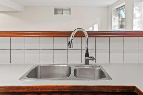 436 Attica Drive Se, Calgary, AB - Indoor Photo Showing Kitchen With Double Sink