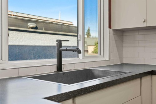 436 Attica Drive Se, Calgary, AB - Indoor Photo Showing Kitchen With Double Sink