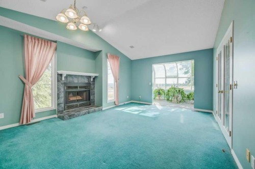 54-5790 Patina Drive Sw, Calgary, AB - Indoor With Fireplace