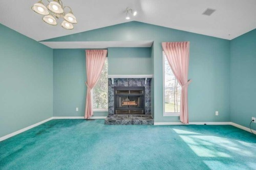 54-5790 Patina Drive Sw, Calgary, AB - Indoor With Fireplace