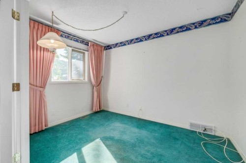 54-5790 Patina Drive Sw, Calgary, AB - Indoor Photo Showing Other Room