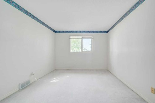 54-5790 Patina Drive Sw, Calgary, AB - Indoor Photo Showing Other Room