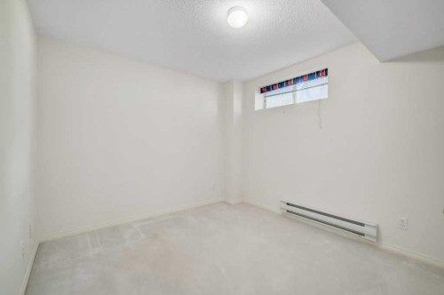 54-5790 Patina Drive Sw, Calgary, AB - Indoor Photo Showing Other Room