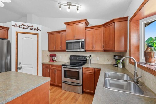 79 Hillcrest Boulevard, Strathmore, AB - Indoor Photo Showing Kitchen With Double Sink
