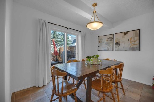 154 Bridlewood Court Sw, Calgary, AB - Indoor Photo Showing Dining Room
