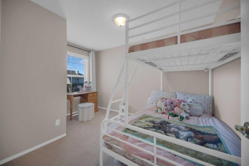 154 Bridlewood Court Sw, Calgary, AB - Indoor Photo Showing Bedroom