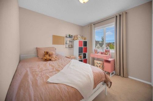 154 Bridlewood Court Sw, Calgary, AB - Indoor Photo Showing Bedroom