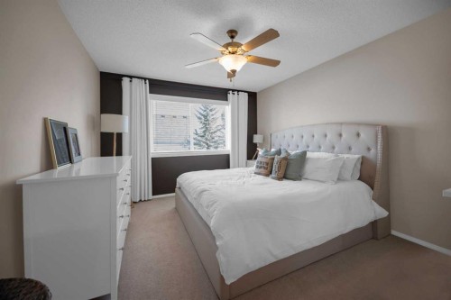 154 Bridlewood Court Sw, Calgary, AB - Indoor Photo Showing Bedroom
