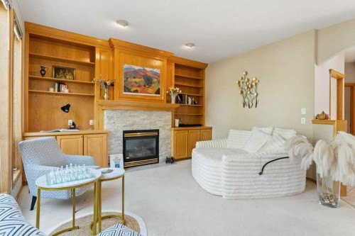 10 Grande Point Estates, Strathmore, AB - Indoor Photo Showing Living Room With Fireplace