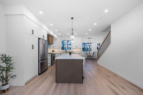 97 23 Street Nw, Calgary, AB - Indoor Photo Showing Kitchen With Upgraded Kitchen