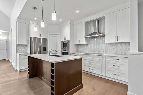 54 Drake Landing Square, Okotoks, AB - Indoor Photo Showing Kitchen With Upgraded Kitchen