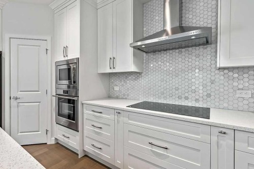 54 Drake Landing Square, Okotoks, AB - Indoor Photo Showing Kitchen