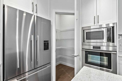 54 Drake Landing Square, Okotoks, AB - Indoor Photo Showing Kitchen