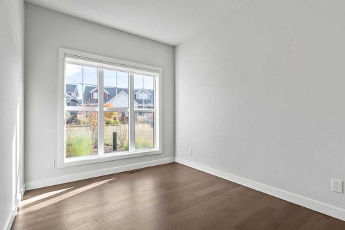 54 Drake Landing Square, Okotoks, AB - Indoor Photo Showing Other Room