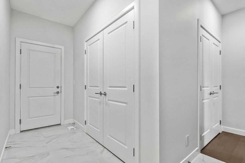 54 Drake Landing Square, Okotoks, AB - Indoor Photo Showing Other Room