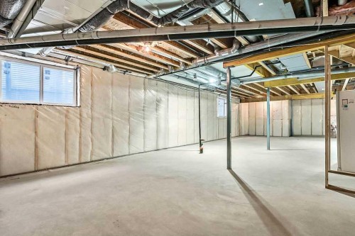 54 Drake Landing Square, Okotoks, AB - Indoor Photo Showing Basement