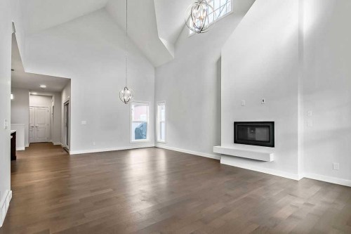 54 Drake Landing Square, Okotoks, AB - Indoor With Fireplace