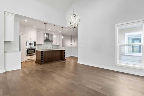 54 Drake Landing Square, Okotoks, AB - Indoor Photo Showing Kitchen With Upgraded Kitchen