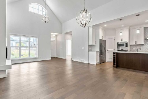 54 Drake Landing Square, Okotoks, AB - Indoor Photo Showing Kitchen With Upgraded Kitchen