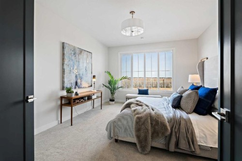 86 Cimarron Estates Drive, Okotoks, AB - Indoor Photo Showing Bedroom