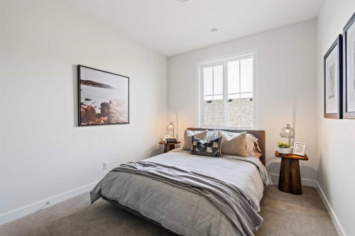 86 Cimarron Estates Drive, Okotoks, AB - Indoor Photo Showing Bedroom
